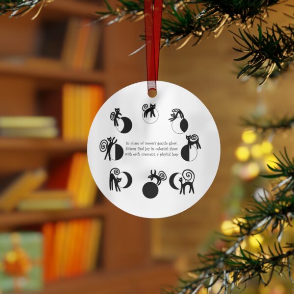 A christmas ornament hanging on the tree.