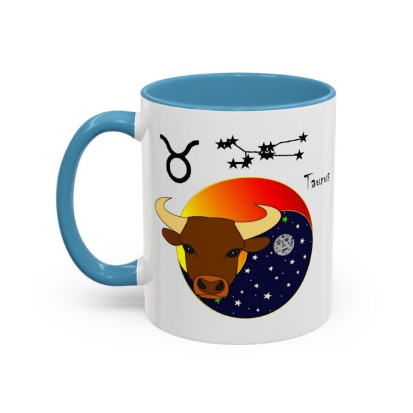 A blue and white mug with an image of a bull.