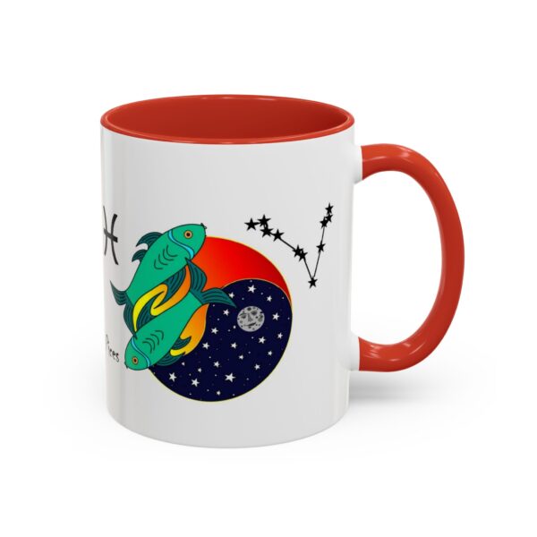 A red and white coffee mug with an illustration of a space ship.