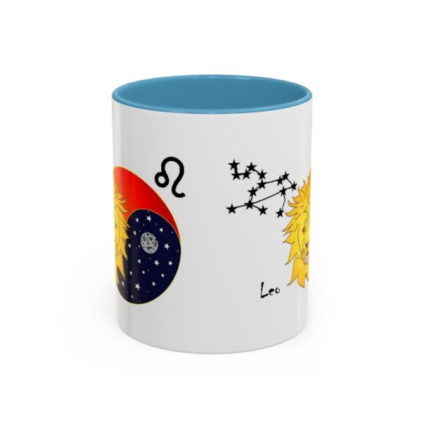 A blue and white mug with an image of the sun, moon and stars.