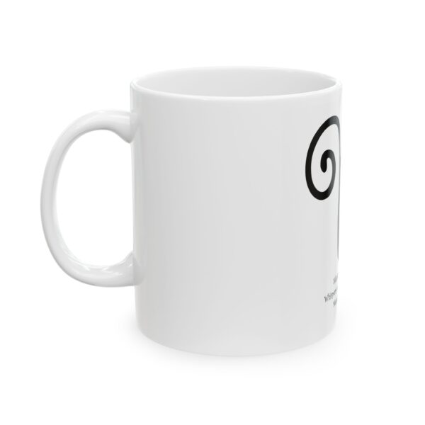 A white coffee mug with the word " om ".