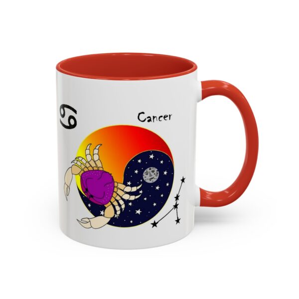 A red and white coffee mug with an image of cancer.