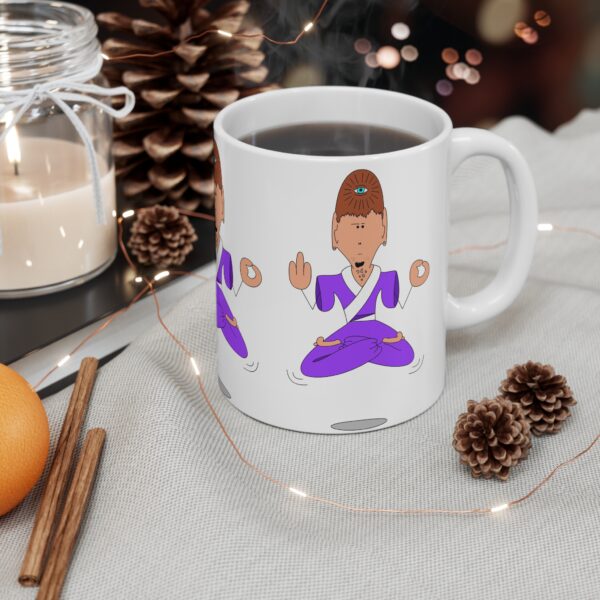 A coffee mug with an image of a person in yoga poses.