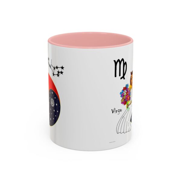 A pink and white mug with the words " scorpio."