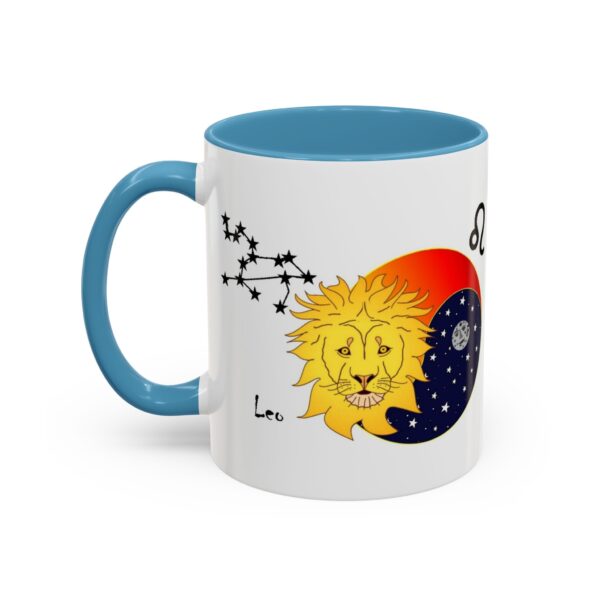 A blue and white mug with an image of the sun, moon and stars.