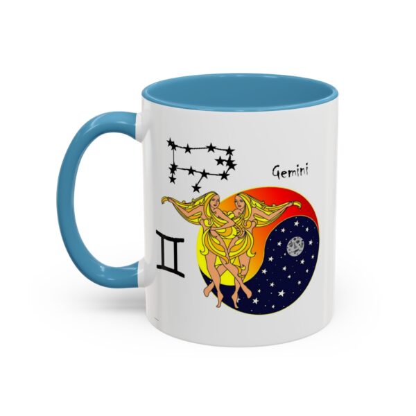 A blue and white mug with an illustration of gemini