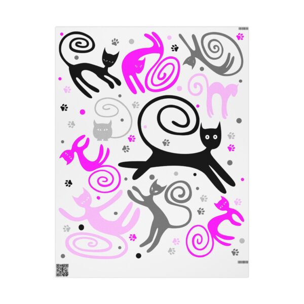 A black and white cat with pink cats on it