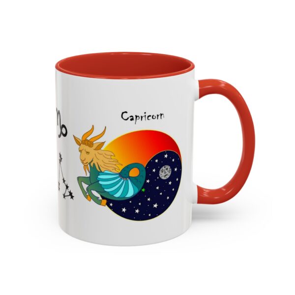 A red and white coffee mug with an astrology design.