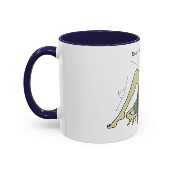 A mug with a drawing of a frog on it.