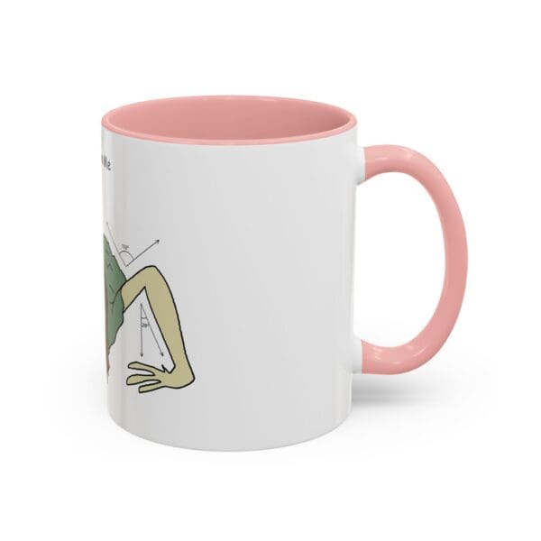 A pink and white mug with a cartoon of a person sitting on the ground