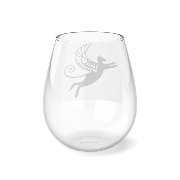 A glass with an image of a fairy on it.