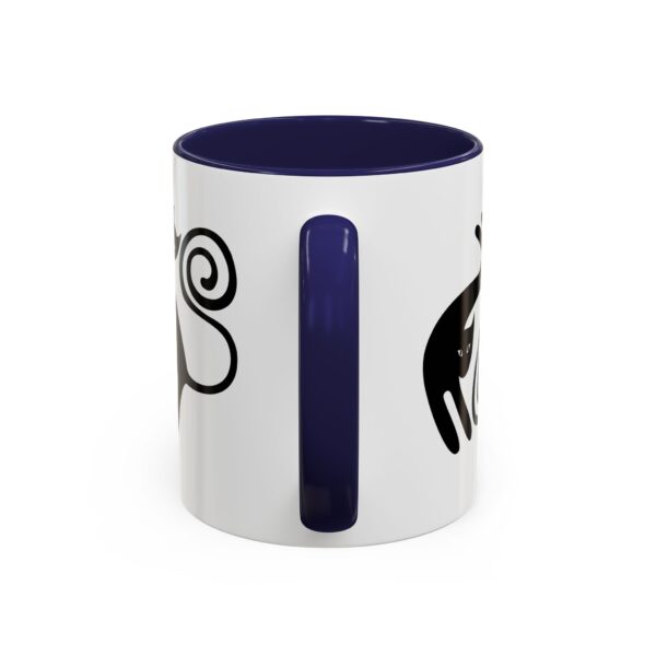 A blue and white coffee mug with an image of two different animals.