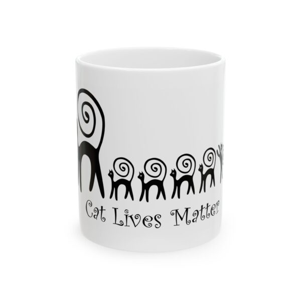 A white coffee mug with the words " cat lives matter ".