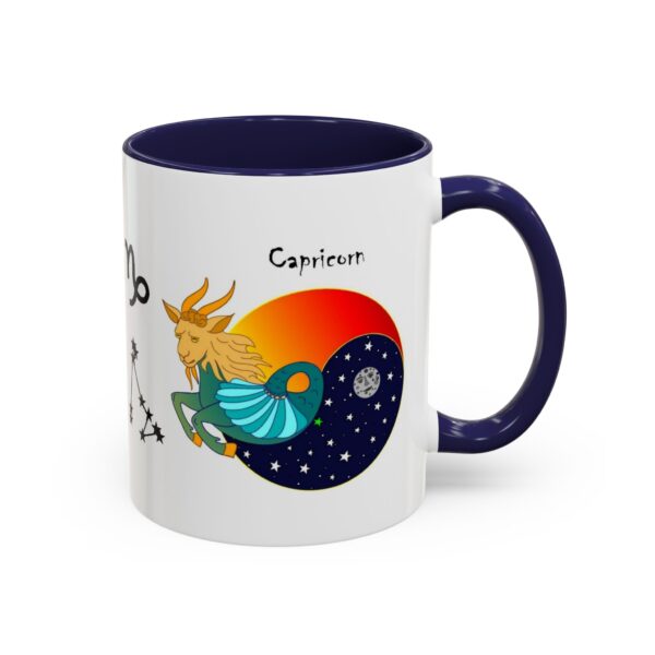 A blue and white mug with an astrology design.