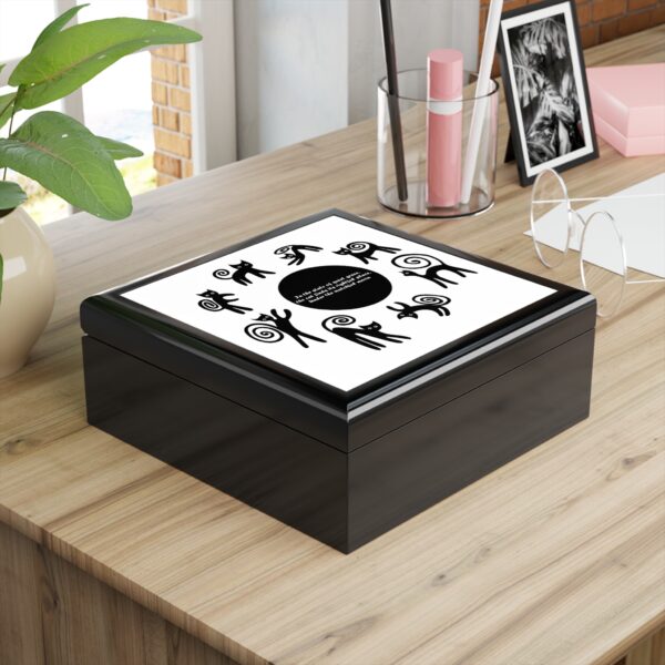 A black and white box on top of a table.