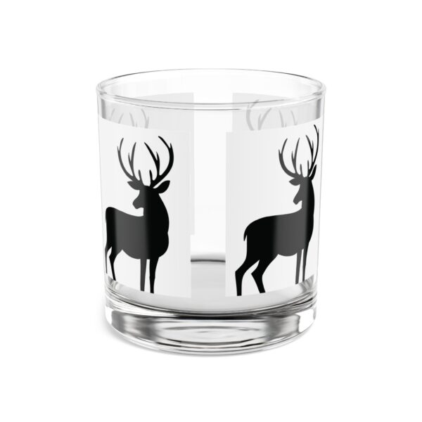 A glass with deer on it