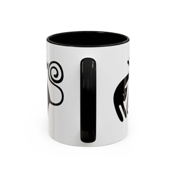 A black and white coffee mug with the words " it " on it.