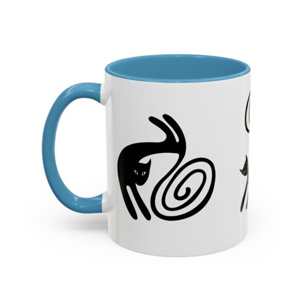 A blue and white mug with some black designs