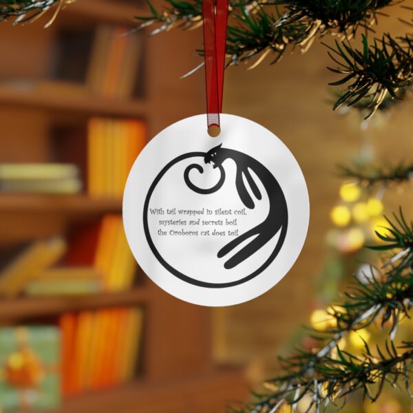 A christmas ornament hanging on the tree.