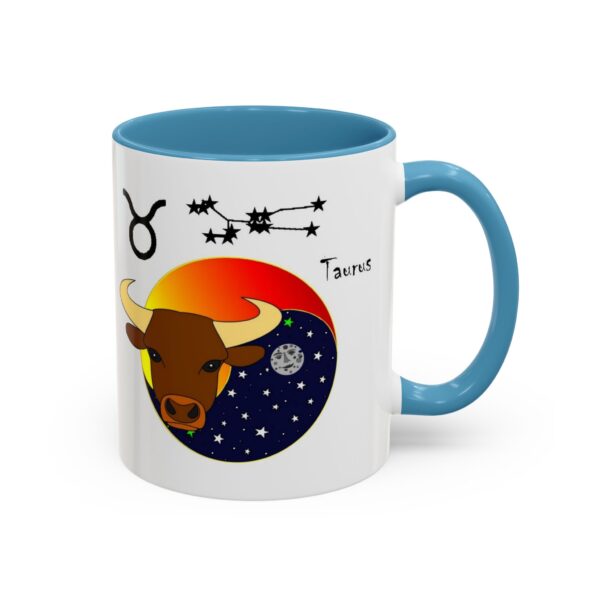 A blue and white mug with an image of taurus.