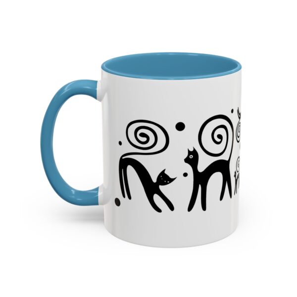 A blue and white mug with an abstract design.