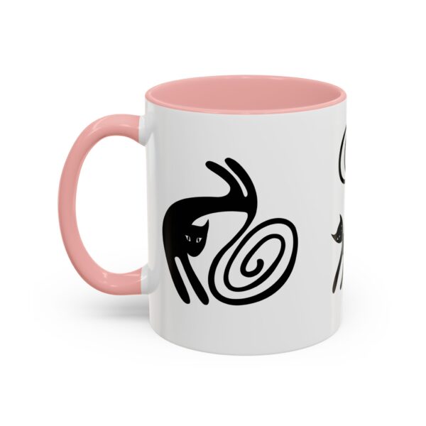 A pink and white mug with an image of a person holding a spiral.