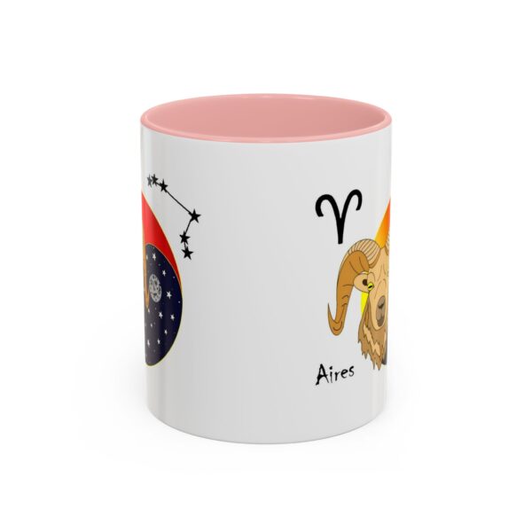 A pink and white mug with an image of the zodiac sign.