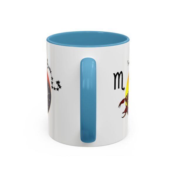 A blue and white mug with the words " scorpio ".