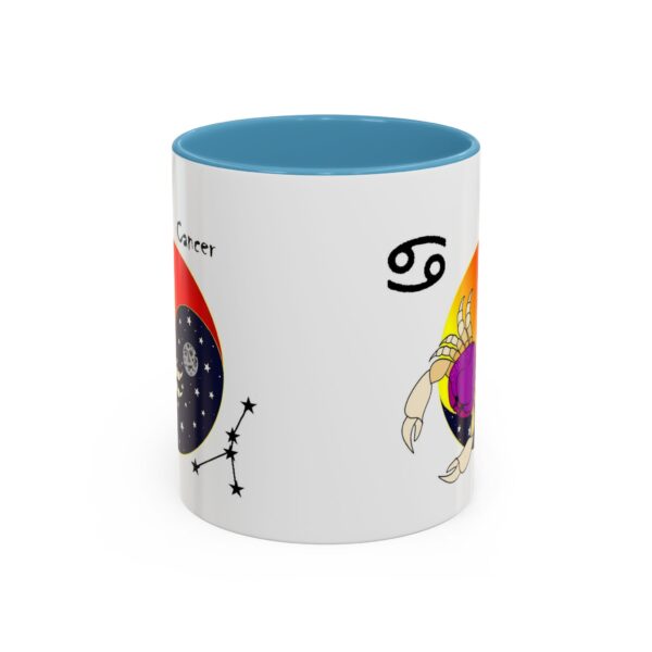 A blue and white mug with an illustration of the zodiac sign.