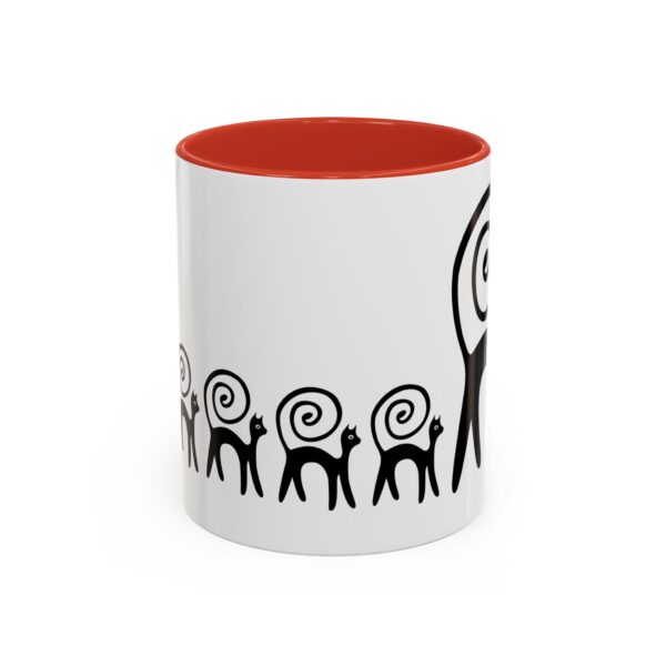 A mug with an image of a tree and people.