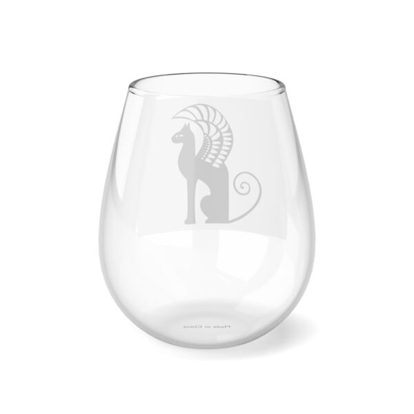 A glass with an image of a lion on it.