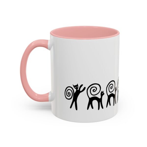 A pink and white mug with an image of a monkey.