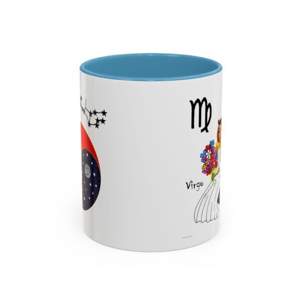 A blue and white mug with the zodiac sign for virgo on it.