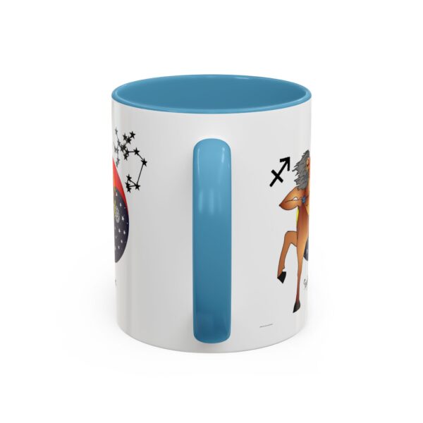 A blue and white mug with an animal design.