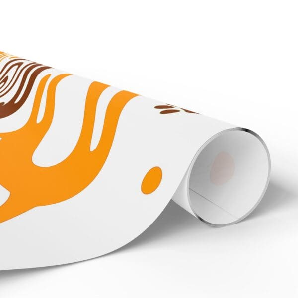 A roll of paper with an orange and brown design on it.