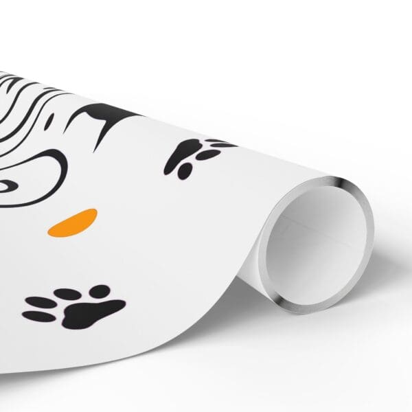 A roll of wrapping paper with a woman face and paw prints.