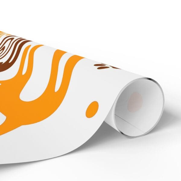 A roll of paper with an orange and brown design on it.