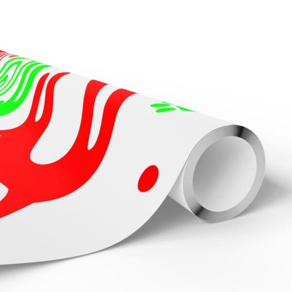 A roll of wrapping paper with red and green designs.