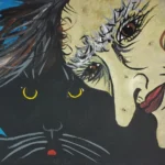 Witch and black cat with striking eyes.