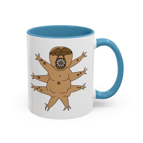 Cartoonish mug with a creature design.