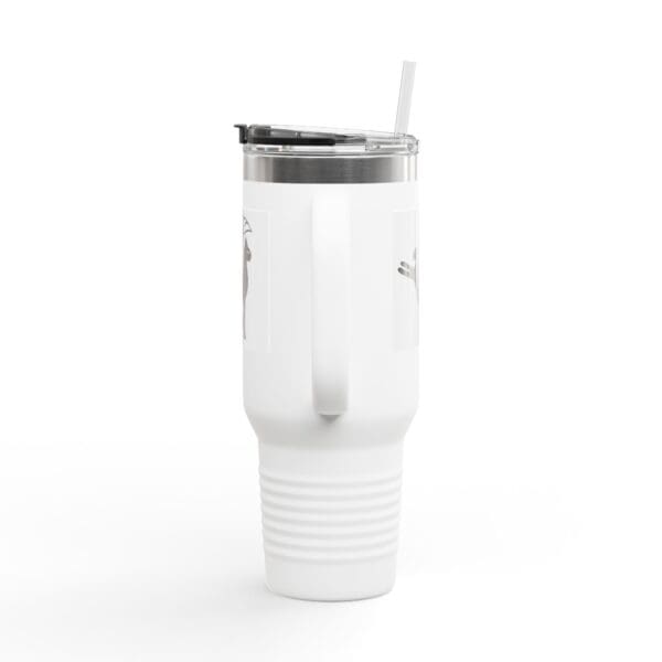 White tumbler with straw and handle.