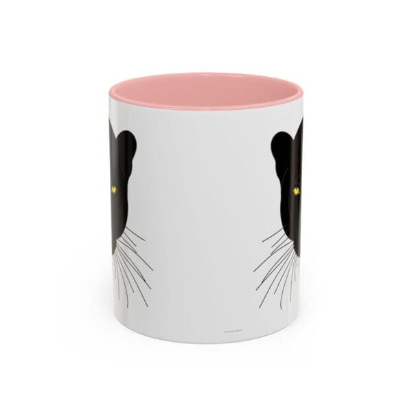 Black cat design mug with pink interior.