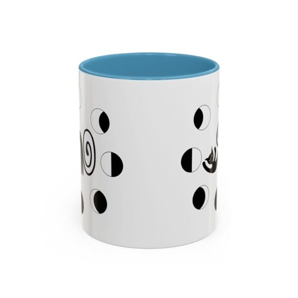 Decorative mug with black and white patterns.