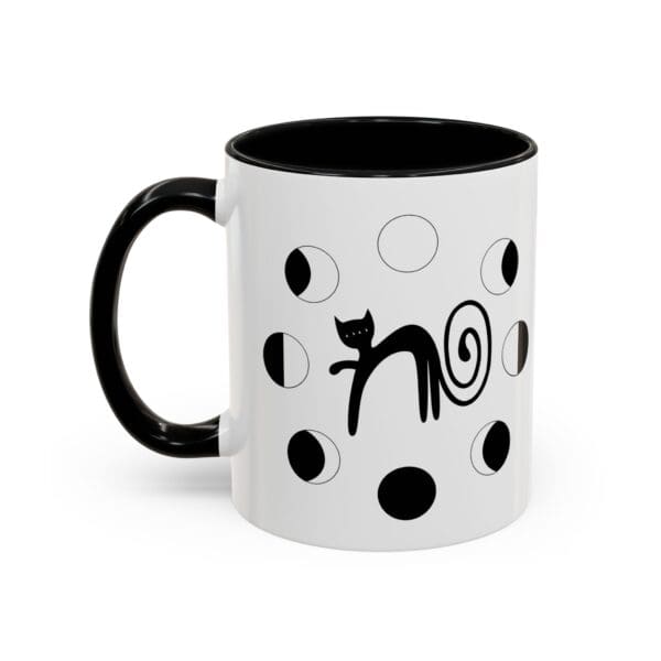 Black and white cat design on mug.