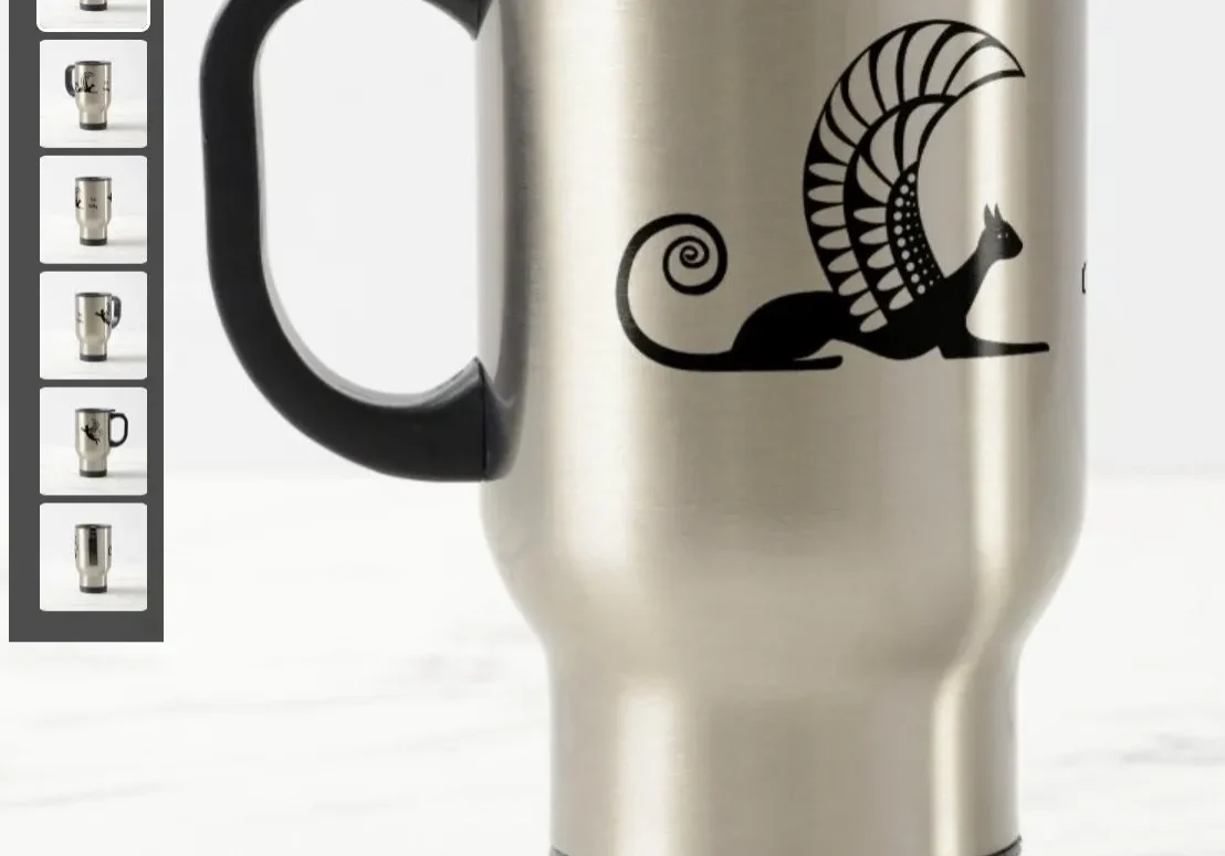 A silver travel mug with an image of a cat on it.